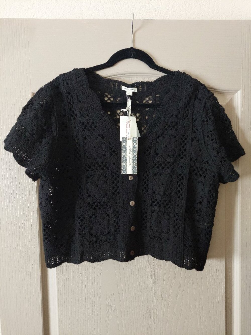 cropped, short-sleeve black crochet cardigan sweater